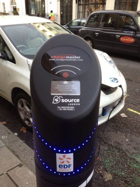 An electric car charging in central London.